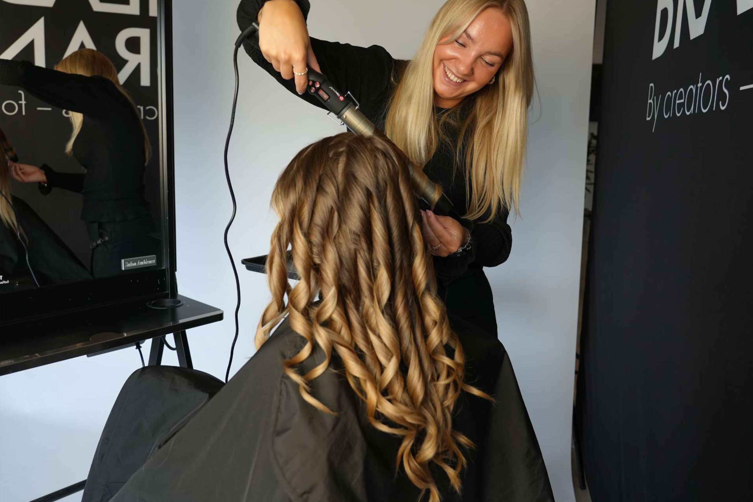 girls fixing hair